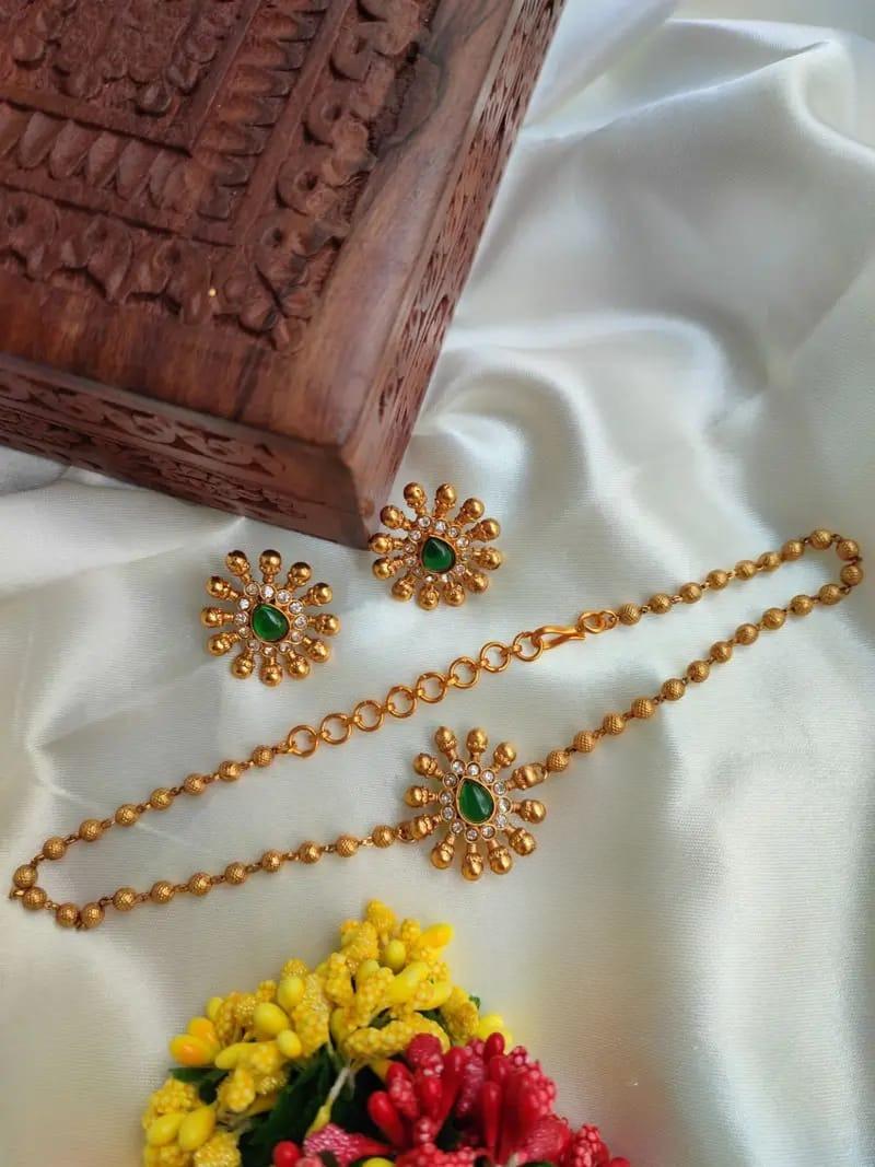 Antique Gold-Plated Stone Jewelry Set Textured Bead Mala with Floral Sunburst Pendant & Earrings