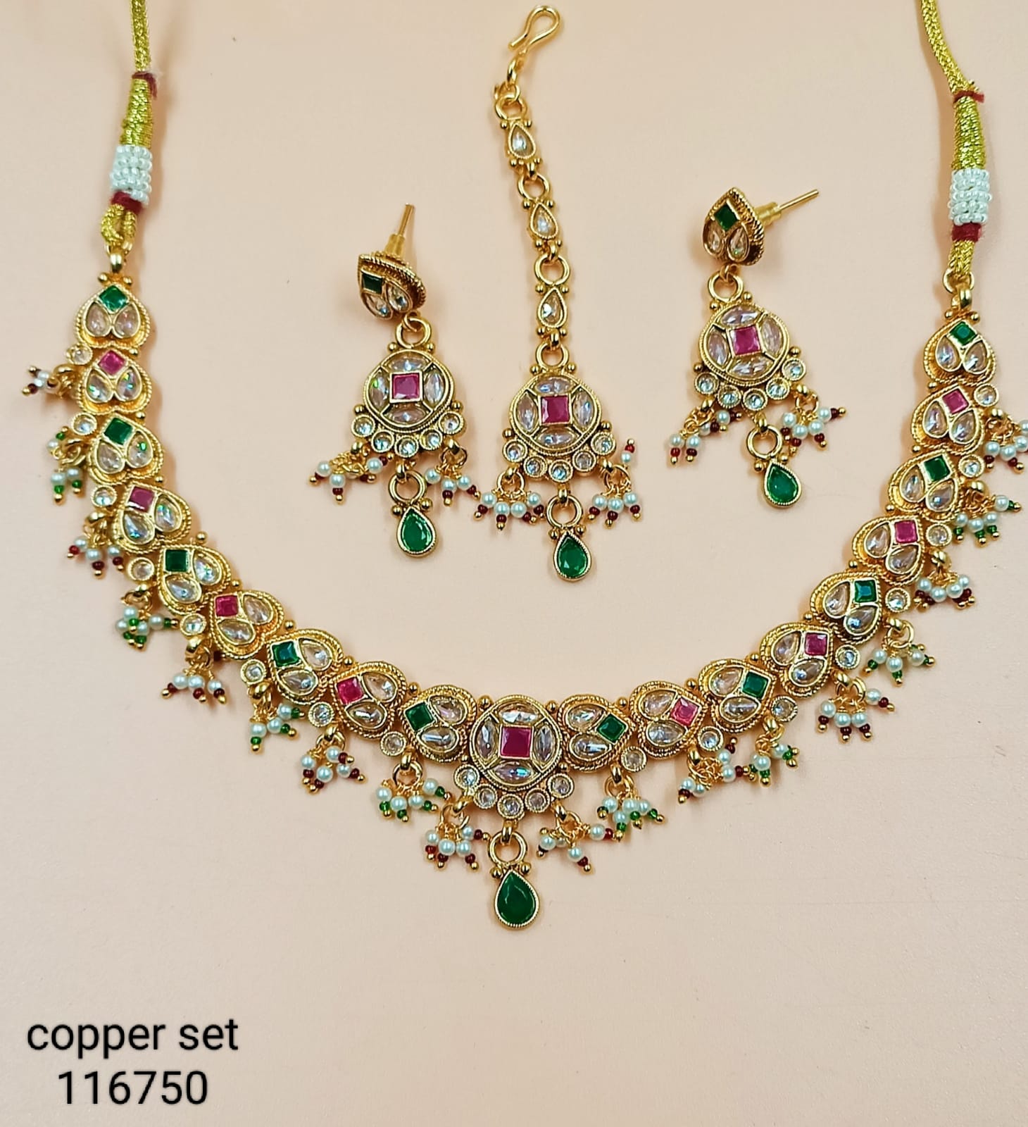 Elegant Traditional Jewelry Set with Intricate Detailing and Pearl Accents