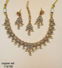 Elegant Traditional Jewelry Set with Intricate Detailing and Pearl Accents