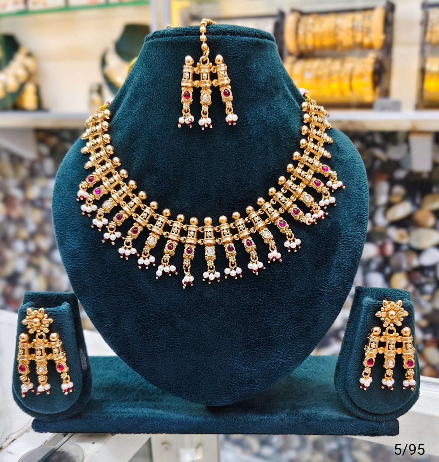 Elegant Traditional Gold Necklace Set with Intricate Detailing and Matching Earrings