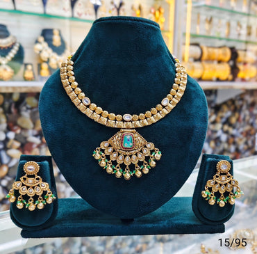 Elegant Traditional Necklace Set with Intricate Detailing and Matching Earrings