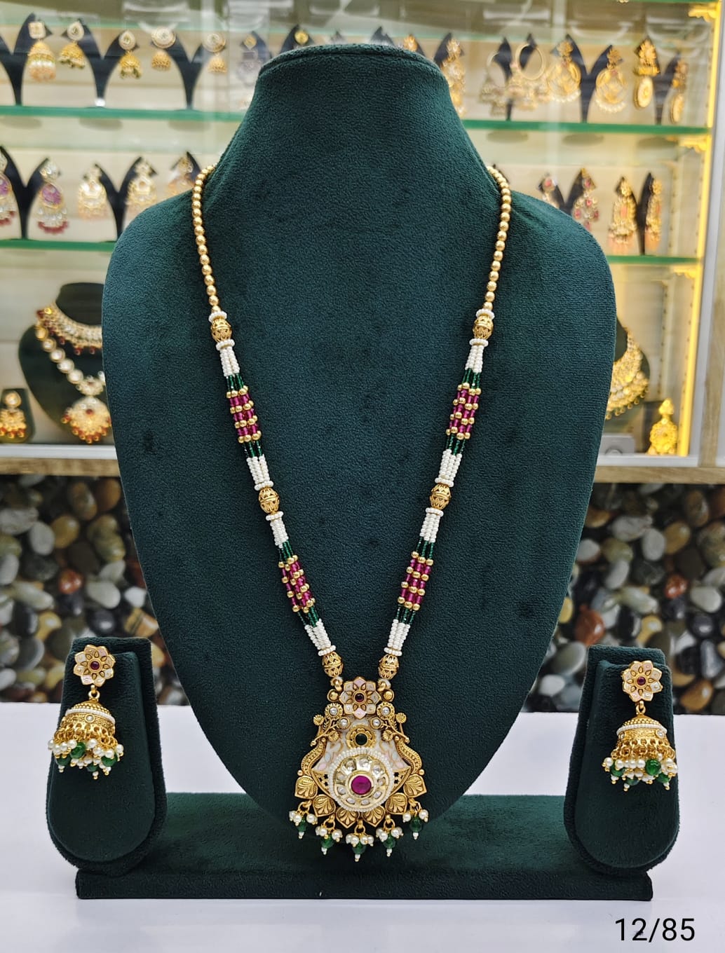 Elegant Traditional Pearl Beaded Necklace with Intricate Pendant and Matching Jhumka Earrings