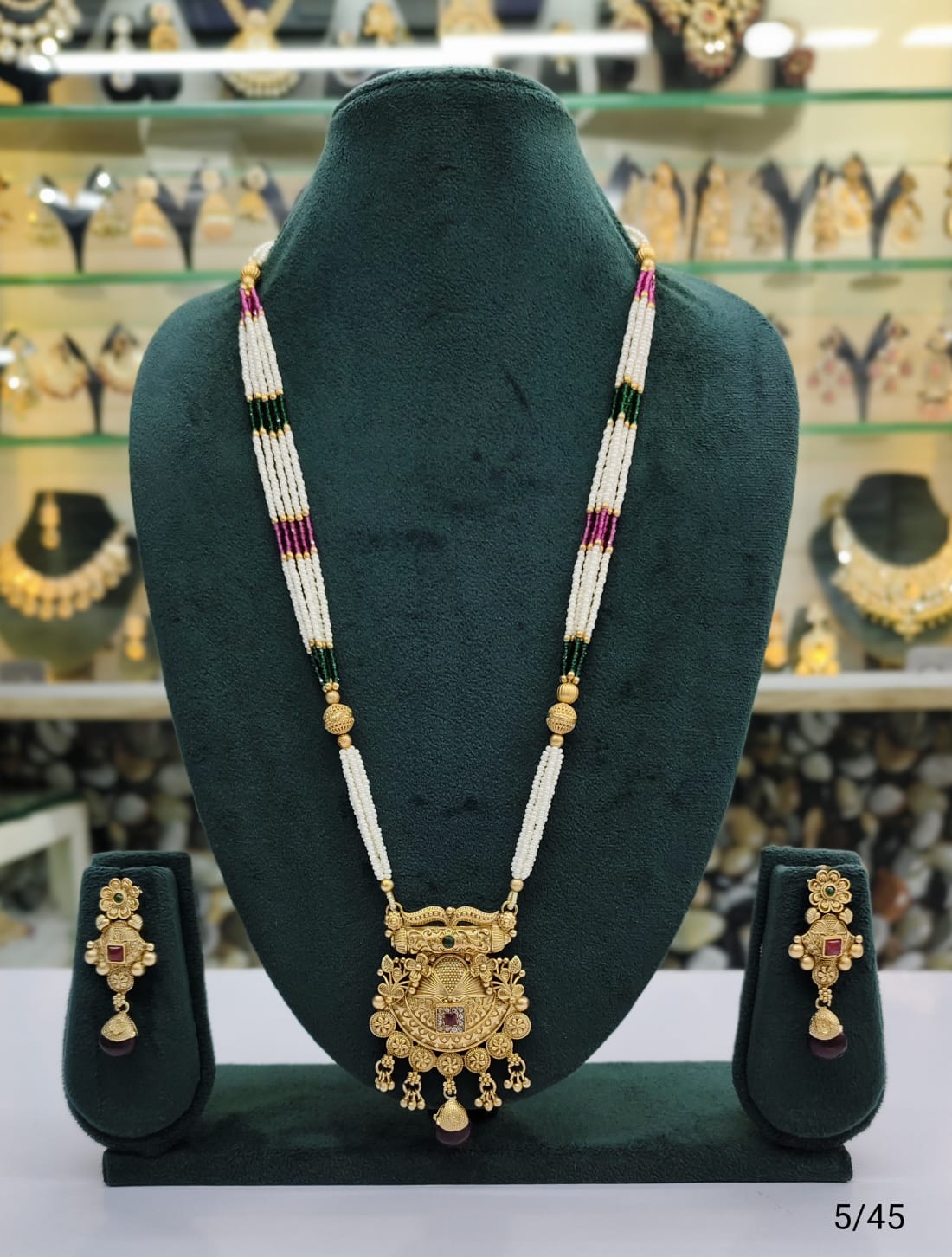 Intricate Gold Pendant Necklace & Earring Set with White and Green Beads