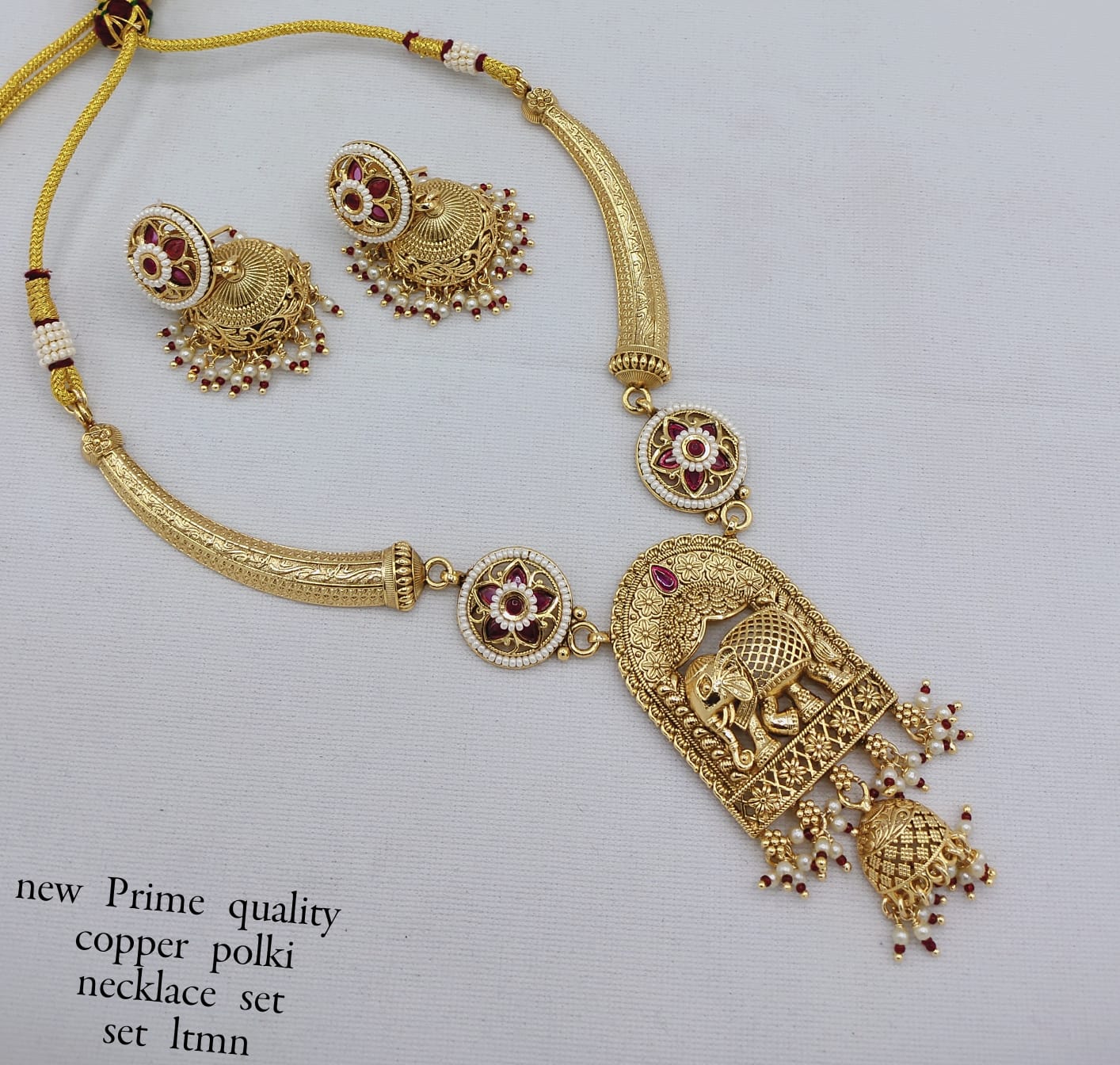 Regal Elephant Motif Copper Necklace Set with CZ Stone Embellishment