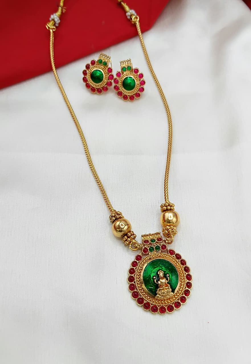 Gold Goddess Lakshmi Pendant with Emerald Green Stones