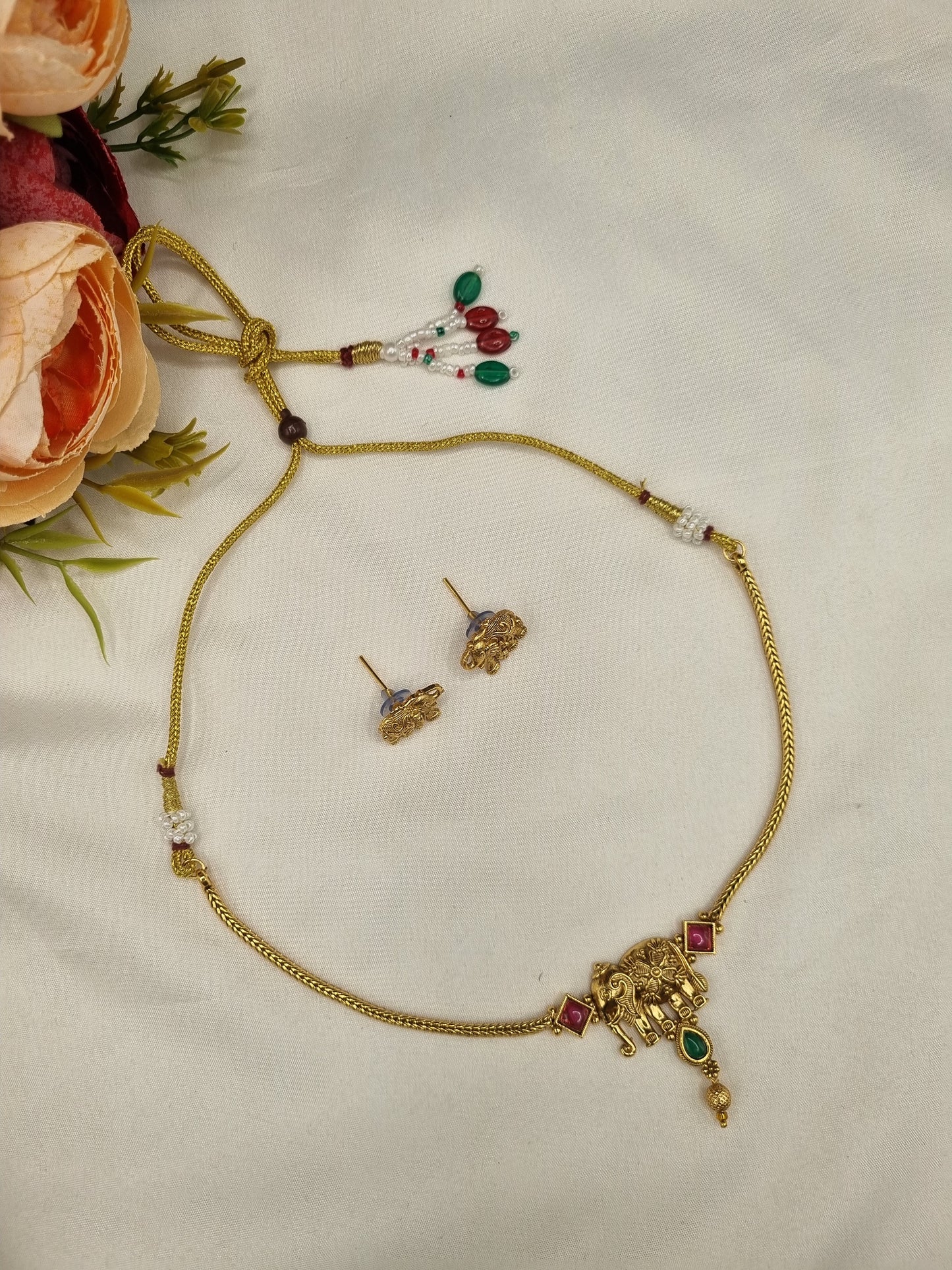 SUTHON GOLD FINISH ELEPHANT MOTIF NECKLACE SET WITH MATCHING STUDS