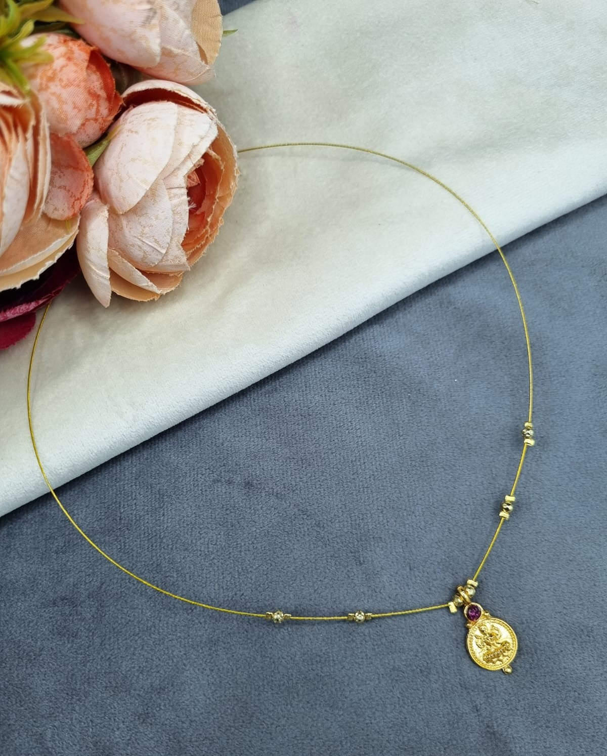 Invisible Wire Lakshmi Coin Pendant Necklace with Gold Bead Accents